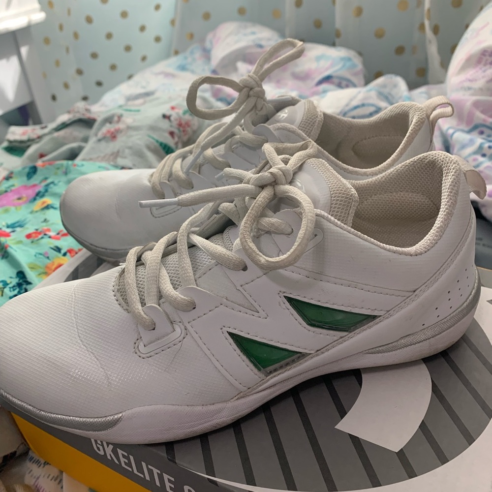 White and Green Athletic Shoes